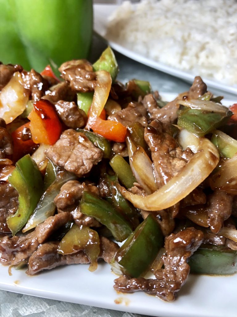 Pepper Steak is a tasty asian style dish served on a bed of white rice!